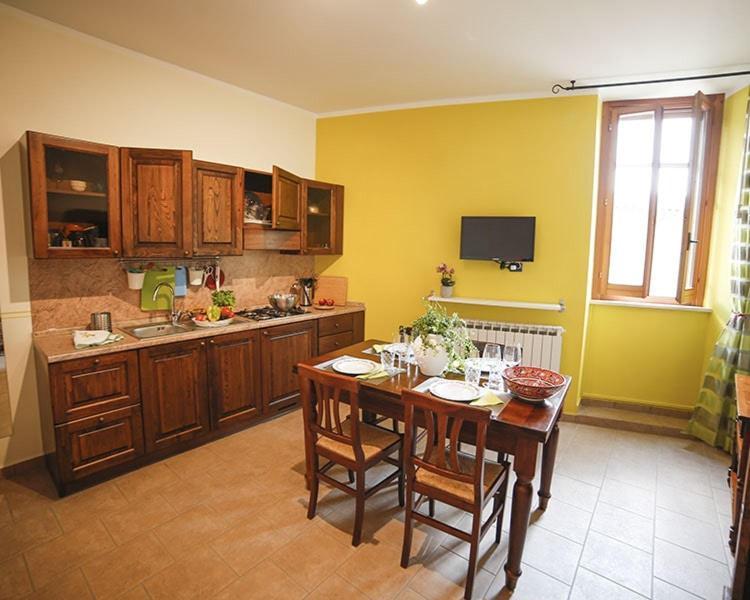 Palazzo Le Muse Apartments Беванья Экстерьер фото